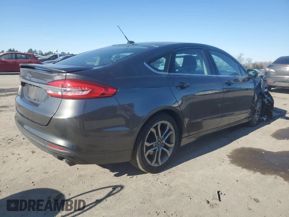 2017 Ford Fusion S with VIN 3FA6P0G76HR201606, listed as a Copart auction lot 41729265 with 124,475 mi miles and Salvage Title. Bid and sale history available at DreamBid. Image 3.