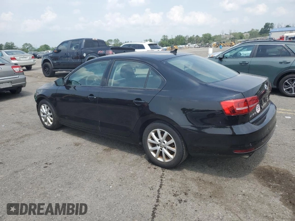 2015 Volkswagen Jetta SE with VIN 3VWD17AJ1FM349301, listed as a Copart auction lot 58963255 with 156,480 mi miles and Salvage title. Bid and sale history available at DreamBid. Image 2.