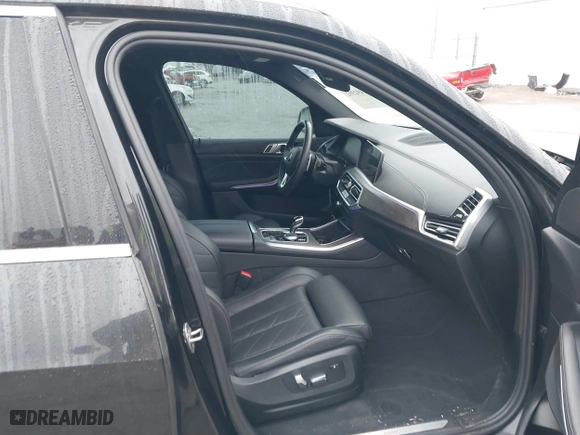 2023 BMW X5 xDrive40i with VIN 5UXCR6C03P9P62891, listed as a IAAI auction lot 41492392 with 51,471 mi miles. Bid and sale history available at carsss.com. Image 5.
