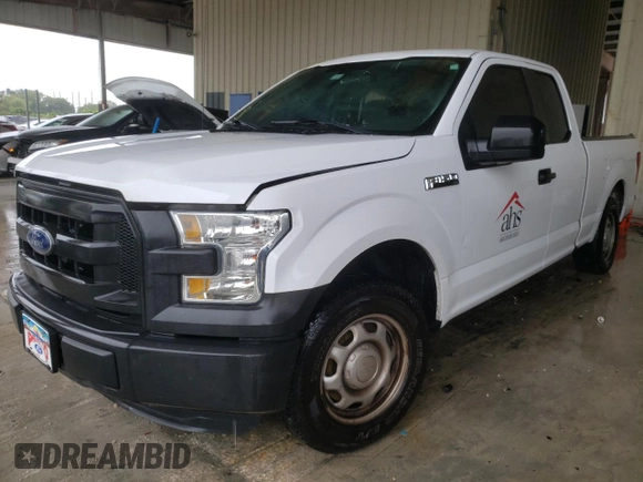 2015 Ford F-150 XL with VIN 1FTEX1C85FKF13167, listed as a Copart auction lot 34733242 with 132,096 mi miles and Salvage Title. Bid and sale history available at carsss.com. Image 2.