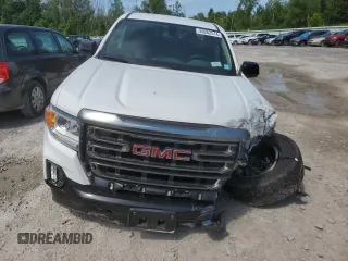 2022 GMC Canyon 4WD AT4 w/Leather with VIN 1GTG6FENXN1155791, listed as a Copart auction lot 59262514 with 31,303 mi miles and Salvage Title. Bid and sale history available at carsss.com. Image 5.