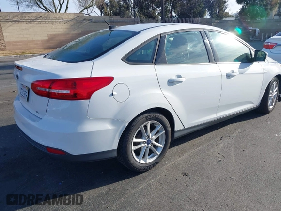 2016 Ford Focus SE with VIN 1FADP3F25GL339312, listed as a IAAI auction lot 41758115 with 77,972 mi miles. Bid and sale history available at carsss.com. Image 4.