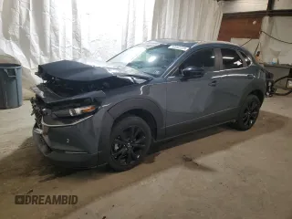 2024 Mazda CX-30 S Carbon Edition z VIN 3MVDMBCM5RM632985, wystawiony jako Copart lot #50592225 z przebiegiem 12 118 mil mil oraz Szkody całkowita. Historia ofert i sprzedaży dostępna na DreamBid. Obrazek 1.