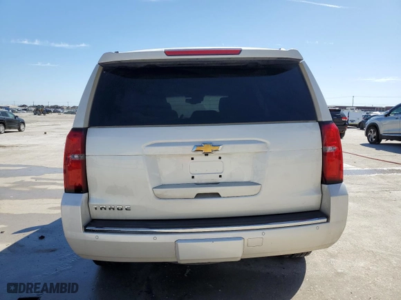 2015 Chevrolet Tahoe LTZ with VIN 1GNSCCKC0FR639998, listed as a Copart auction lot 46825225 with 0 mi miles and Salvage Title. Bid and sale history available at carsss.com. Image 6.
