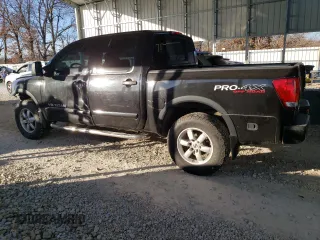 2010 Nissan Titan LE with VIN 1N6BA0EC4AN315443, listed as a Copart auction lot 85303574 with 221,248 mi miles and Salvage Title. Bid and sale history available at carsss.com. Image 2.