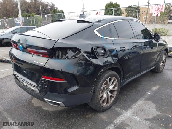 2021 BMW X6 xDrive40i with VIN 5UXCY6C08M9G88854, listed as a IAAI auction lot 41733568 with 30,150 mi miles. Bid and sale history available at carsss.com. Image 4.
