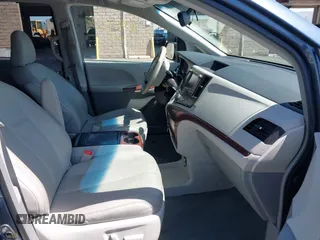 2014 Toyota Sienna XLE with VIN 5TDYK3DC5ES447155, listed as a IAAI auction lot 42003951 with 60,064 mi miles and . Bid and sale history available at DreamBid. Image 5.