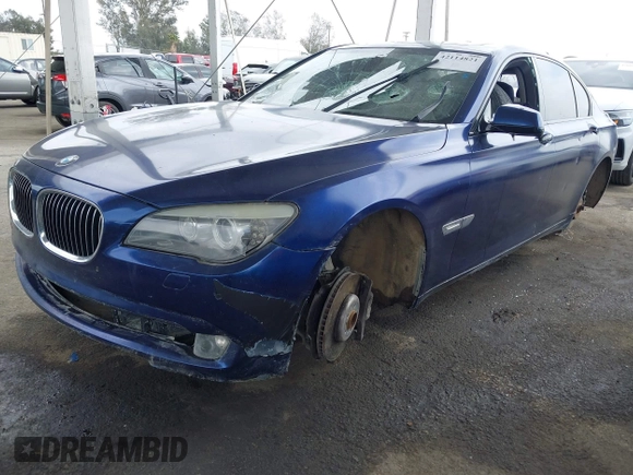 2011 BMW 7 Series 750i with VIN WBAKA8C50BCY36787, listed as a IAAI auction lot 42114821 with 114,796 mi miles. Bid and sale history available at carsss.com. Image 2.