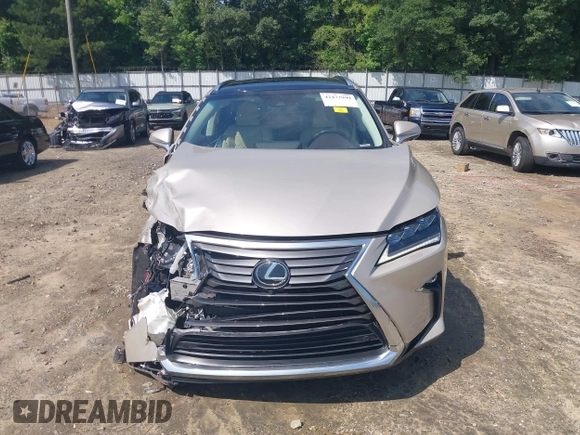 2017 Lexus RX 350 z VIN 2T2ZZMCA1HC056647, wystawiony jako IAAI lot #42472999 z przebiegiem 54 957 mil mil oraz . Historia ofert i sprzedaży dostępna na DreamBid. Obrazek 13.