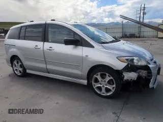 2009 Mazda 5 Grand Touring with VIN JM1CR293390335231, listed as a Copart auction lot 55560285 with 96,502 mi miles and Salvage title. Bid and sale history available at DreamBid. Image 4.