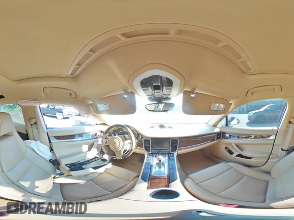 2014 Porsche Panamera с VIN WP0AA2A77EL008465, выставлен на аукционе Copart как лот 69671134 с пробегом Не указан миль и Чистый • Clean title. История ставок и продаж доступна на DreamBid. Изображение 13.