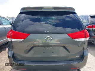 2014 Toyota Sienna XLE with VIN 5TDYK3DC2ES448876, listed as a IAAI auction lot 42519351 with 154,601 mi miles and . Bid and sale history available at DreamBid. Image 16.
