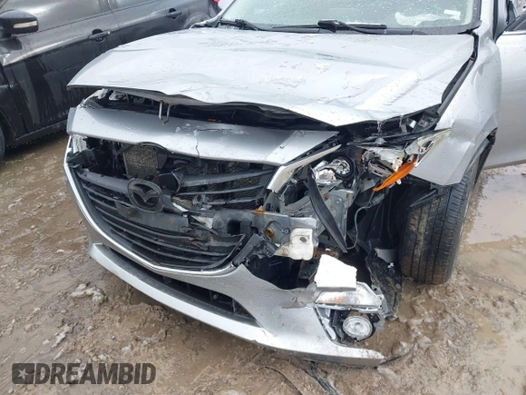 2015 Mazda 3 i Grand Touring with VIN JM1BM1W79F1256535, listed as a IAAI auction lot 41474347 with 128,573 mi miles and . Bid and sale history available at DreamBid. Image 6.