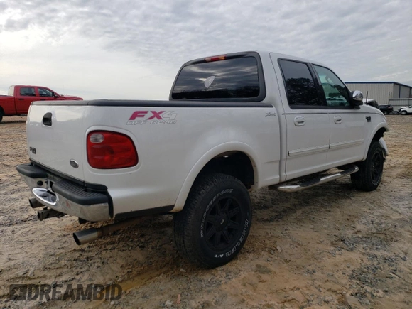 2002 Ford F-150 XLT with VIN 1FTRW08682KC80529, listed as a Copart auction lot 37546994 with 159,980 mi miles and Salvage Title. Bid and sale history available at carsss.com. Image 3.