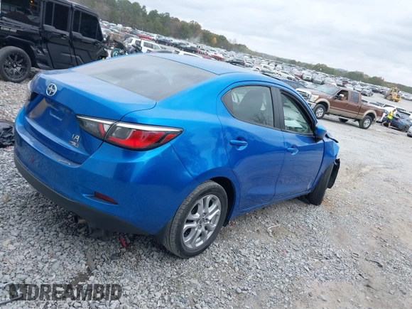 2016 Scion iA with VIN 3MYDLBZV2GY138644, listed as a IAAI auction lot 40790811 with 87,445 mi miles. Bid and sale history available at carsss.com. Image 4.