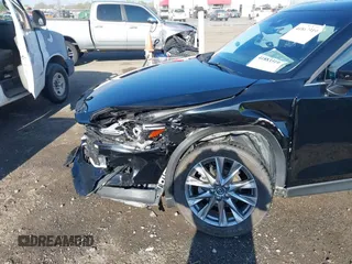 2020 Mazda CX-5 Grand Touring with VIN JM3KFBDM0L0790508, listed as a IAAI auction lot 41883319 with 114,398 mi miles and . Bid and sale history available at carsss.com. Image 17.