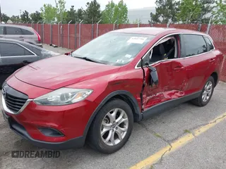 2015 Mazda CX-9 Touring with VIN JM3TB2CV5F0458675, listed as a IAAI auction lot 42047786 with 120,890 mi miles and . Bid and sale history available at carsss.com. Image 2.