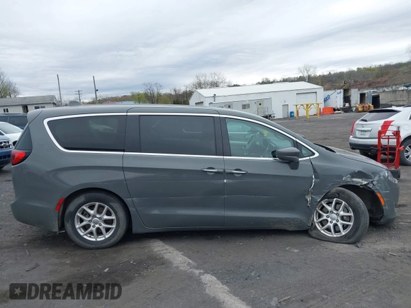 2020 Chrysler Pacifica Touring with VIN 2C4RC1FG3LR245765, listed as a IAAI auction lot 42069689 with 40,869 mi miles and . Bid and sale history available at DreamBid. Image 13.