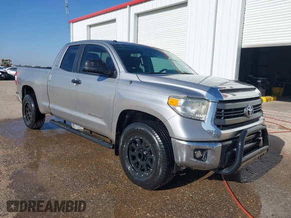 2014 Toyota Tundra SR with VIN 5TFRM5F13EX078411, listed as a IAAI auction lot 42702477 with 123,336 mi miles and . Bid and sale history available at DreamBid. Image 1.