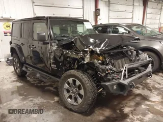 2018 Jeep Wrangler Unlimited Sahara z VIN 1C4HJXEN0JW247806, wystawiony jako IAAI lot #41545569 z przebiegiem 110 705 mil mil oraz . Historia ofert i sprzedaży dostępna na DreamBid. Obrazek 1.
