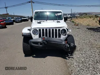 2022 Jeep Gladiator Rubicon z VIN 1C6JJTBG4NL135430, wystawiony jako Copart lot #52581015 z przebiegiem 54 553 mil mil oraz Szkoda całkowita • Salvage title. Historia ofert i sprzedaży dostępna na DreamBid. Obrazek 5.