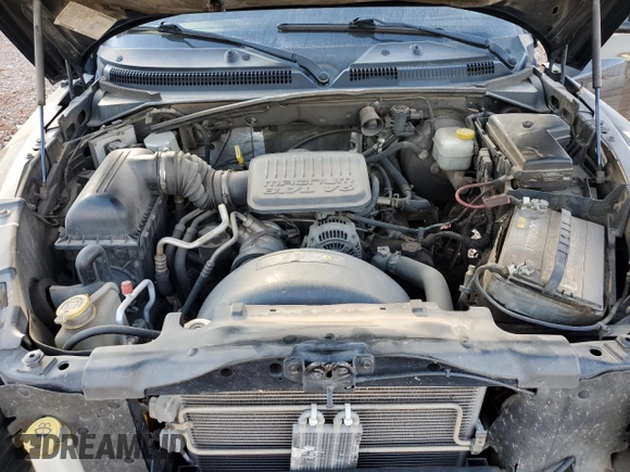 2005 Dodge Dakota SLT z VIN 1D7HW48K45S139614, wystawiony jako Copart lot #83898134 z przebiegiem 200 188 mil mil oraz Szkoda całkowita • Salvage title. Historia ofert i sprzedaży dostępna na DreamBid. Obrazek 12.