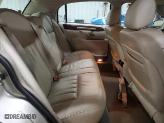 2004 Lincoln Town Car Signature with VIN 1LNHM81W14Y644439, listed as a Copart auction lot 50581705 with 106,001 mi miles and Salvage Title. Bid and sale history available at carsss.com. Image 10.