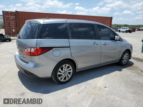 2014 Mazda 5 Sport z VIN JM1CW2BL0E0170901, wystawiony jako Copart lot #57829555 z przebiegiem 102 210 mil mil oraz Szkoda całkowita • Salvage title. Historia ofert i sprzedaży dostępna na DreamBid. Obrazek 3.