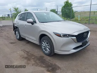 2025 Mazda CX-5 S Preferred z VIN JM3KFBCL1S0582774, wystawiony jako IAAI lot #42355004 z przebiegiem 15 343 mil mil oraz . Historia ofert i sprzedaży dostępna na DreamBid. Obrazek 1.