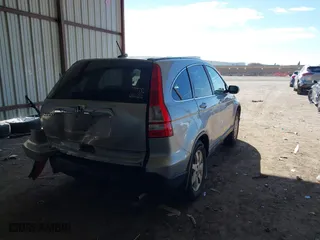 2007 Honda CR-V EX-L with VIN JHLRE387X7C069804, listed as a IAAI auction lot 41616256 with 136,271 mi miles. Bid and sale history available at carsss.com. Image 4.