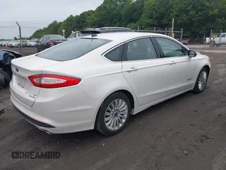 2013 Ford Fusion SE Hybrid with VIN 3FA6P0LU0DR128688, listed as a IAAI auction lot 42580852 with 137,421 mi miles and . Bid and sale history available at DreamBid. Image 4.