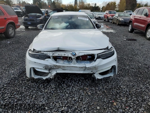2018 BMW M4 z VIN WBS4Z9C54JEA24482, wystawiony jako Copart lot #82237014 z przebiegiem 71 361 mil mil oraz Szkoda całkowita • Salvage title. Historia ofert i sprzedaży dostępna na DreamBid. Obrazek 5.