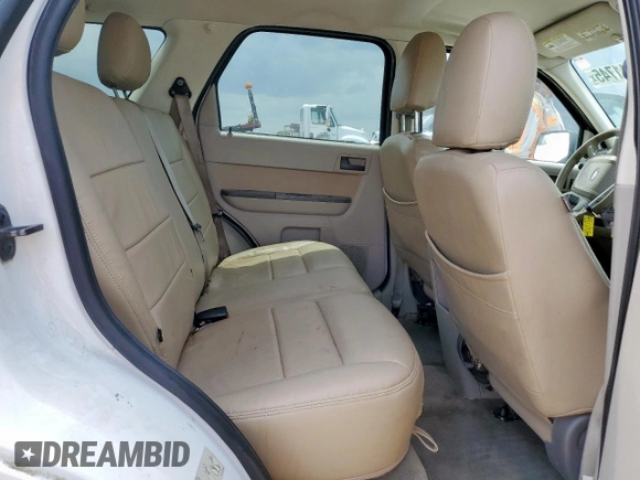 2011 Ford Escape XLT z VIN 1FMCU9D77BKB26159, wystawiony jako Copart lot #59211745 z przebiegiem 252 374 mil mil oraz Szkoda całkowita • Salvage title. Historia ofert i sprzedaży dostępna na DreamBid. Obrazek 10.