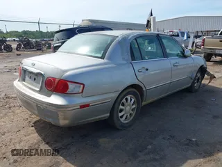 2005 Kia Amanti z VIN KNALD124555056885, wystawiony jako IAAI lot #42320559 z przebiegiem 178 450 mil mil oraz . Historia ofert i sprzedaży dostępna na DreamBid. Obrazek 4.