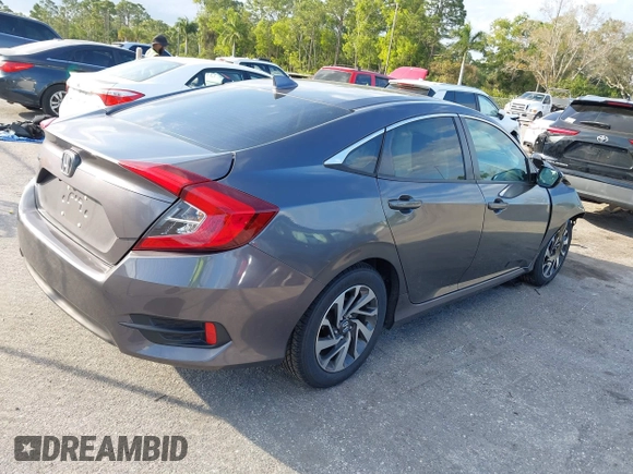 2017 Honda Civic EX z VIN 2HGFC2F75HH564169, wystawiony jako IAAI lot #41482206 z przebiegiem 93 363 mil mil oraz . Historia ofert i sprzedaży dostępna na DreamBid. Obrazek 4.