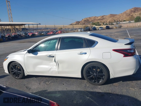 2018 Nissan Altima S with VIN 1N4AL3AP5JC294610, listed as a IAAI auction lot 41436696 with 124,835 mi miles and . Bid and sale history available at DreamBid. Image 14.