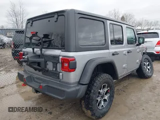 2021 Jeep Wrangler Unlimited Rubicon with VIN 1C4JJXFM6MW543912, listed as a IAAI auction lot 41902609 with 23,224 mi miles. Bid and sale history available at carsss.com. Image 4.