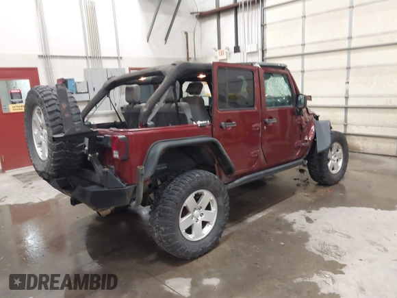 2007 Jeep Wrangler Unlimited Sahara z VIN 1J4GA59157L218278, wystawiony jako IAAI lot #41871773 z przebiegiem 145 992 mil mil oraz . Historia ofert i sprzedaży dostępna na DreamBid. Obrazek 4.