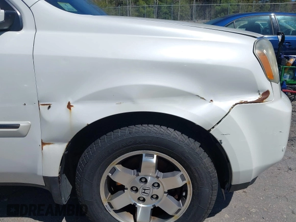 2011 Honda Pilot Touring with VIN 5FNYF4H98BB087713, listed as a IAAI auction lot 42132764 with 250,507 mi miles. Bid and sale history available at carsss.com. Image 6.
