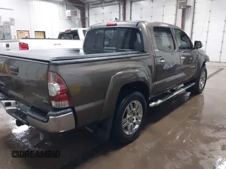 2014 Toyota Tacoma PreRunner with VIN 3TMJU4GNXEM164507, listed as a IAAI auction lot 42118984 with 183,101 mi miles and . Bid and sale history available at DreamBid. Image 4.
