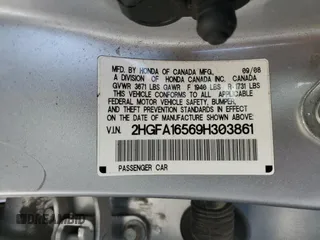 2009 Honda Civic LX z VIN 2HGFA16569H303861, wystawiony jako Copart lot #53148385 z przebiegiem 164 179 mil mil oraz Szkoda całkowita • Salvage title. Historia ofert i sprzedaży dostępna na DreamBid. Obrazek 13.