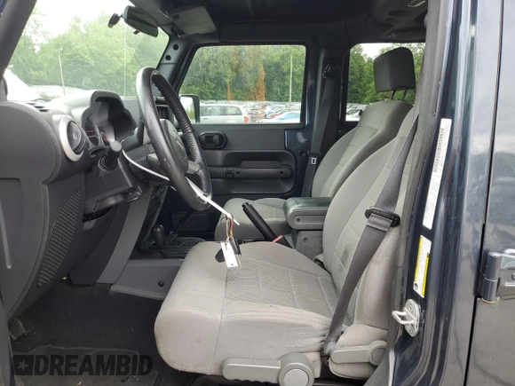 2008 Jeep Wrangler Unlimited Sahara with VIN 1J4GA59108L562831, listed as a Copart auction lot 58949225 with 206,312 mi miles and Clean title. Bid and sale history available at DreamBid. Image 7.