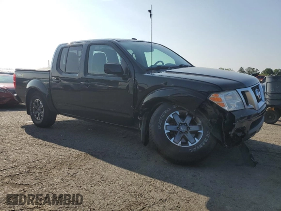 2017 Nissan Frontier Pro-4X with VIN 1N6AD0EV8HN753459, listed as a Copart auction lot 65873765 with 70,809 mi miles and Salvage title. Bid and sale history available at DreamBid. Image 4.