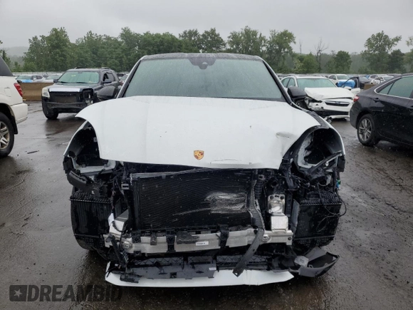 2023 Porsche Cayenne with VIN WP1BK2AY8PDA39066, listed as a Copart auction lot 60699995 with 7,785 mi miles and Salvage title. Bid and sale history available at DreamBid. Image 5.