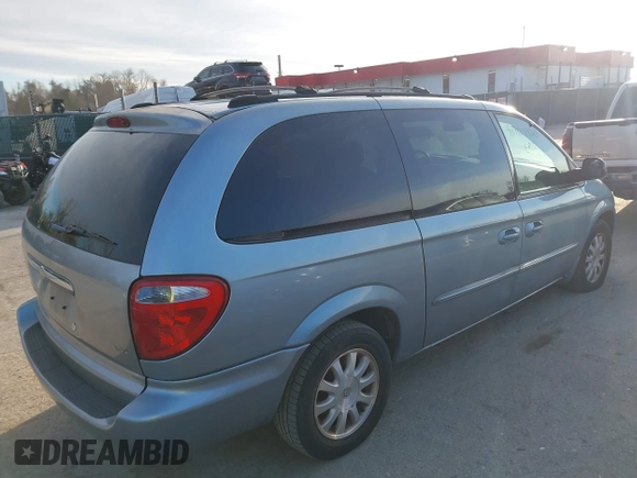 2003 Chrysler Town & Country LX with VIN 2C4GP44L73R238380, listed as a IAAI auction lot 41705420 with 129,225 mi miles and . Bid and sale history available at DreamBid. Image 13.