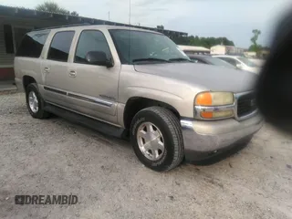 2006 GMC Yukon XL SLE z VIN 1GKEC16Z66J125164, wystawiony jako IAAI lot #42287766 z przebiegiem 164 987 mil mil oraz . Historia ofert i sprzedaży dostępna na DreamBid. Obrazek 1.