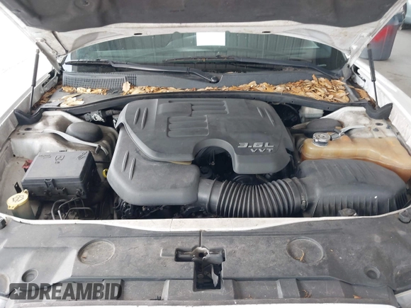 2012 Dodge Charger SE with VIN 2C3CDXBG9CH206975, listed as a IAAI auction lot 42213012 with 150,706 mi miles and . Bid and sale history available at DreamBid. Image 10.