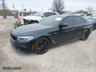 2018 BMW 5 Series M550i xDrive with VIN WBAJB9C57JB036653, listed as a IAAI auction lot 41512154 with 1 mi miles. Bid and sale history available at carsss.com. Image 18.
