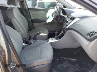 2014 Hyundai Accent GLS with VIN KMHCT4AEXEU710606, listed as a IAAI auction lot 41764163 with 103,859 mi miles. Bid and sale history available at carsss.com. Image 5.
