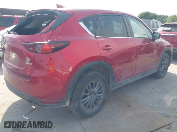 2017 Mazda CX-5 Touring with VIN JM3KFACL3H0195212, listed as a IAAI auction lot 42041361 with 57,377 mi miles and . Bid and sale history available at carsss.com. Image 4.